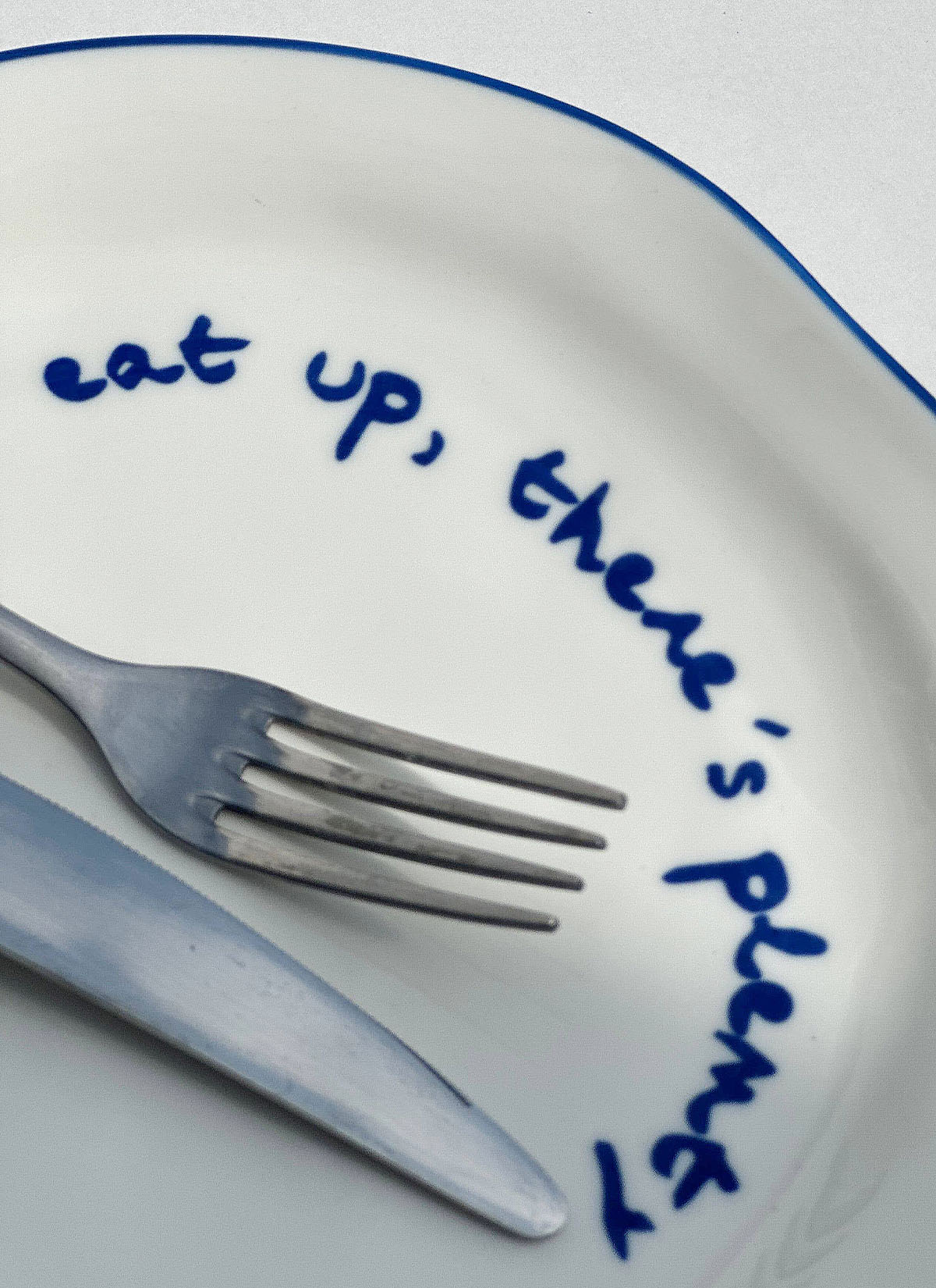 'eat up there's plenty more...' Plate