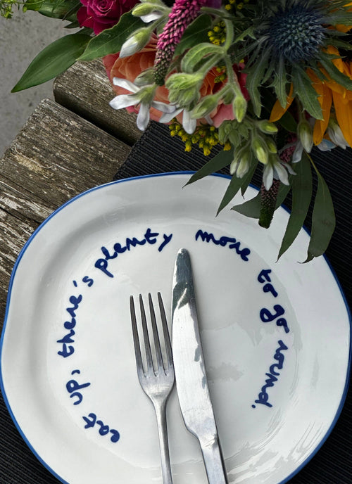 'eat up there's plenty more...' Plate