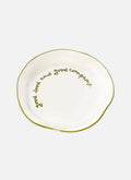 'good food and good company.' Plate