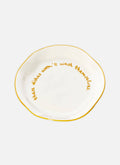 'these dishes won't wash themselves.' Plate