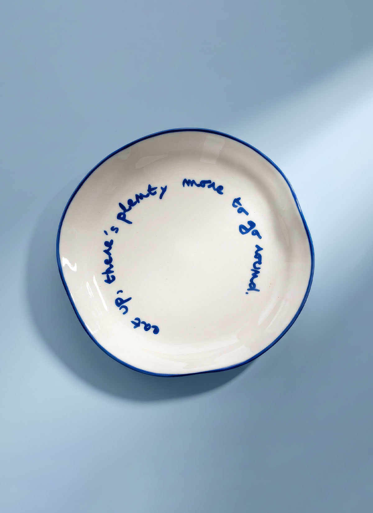 'eat up there's plenty more.' Plate