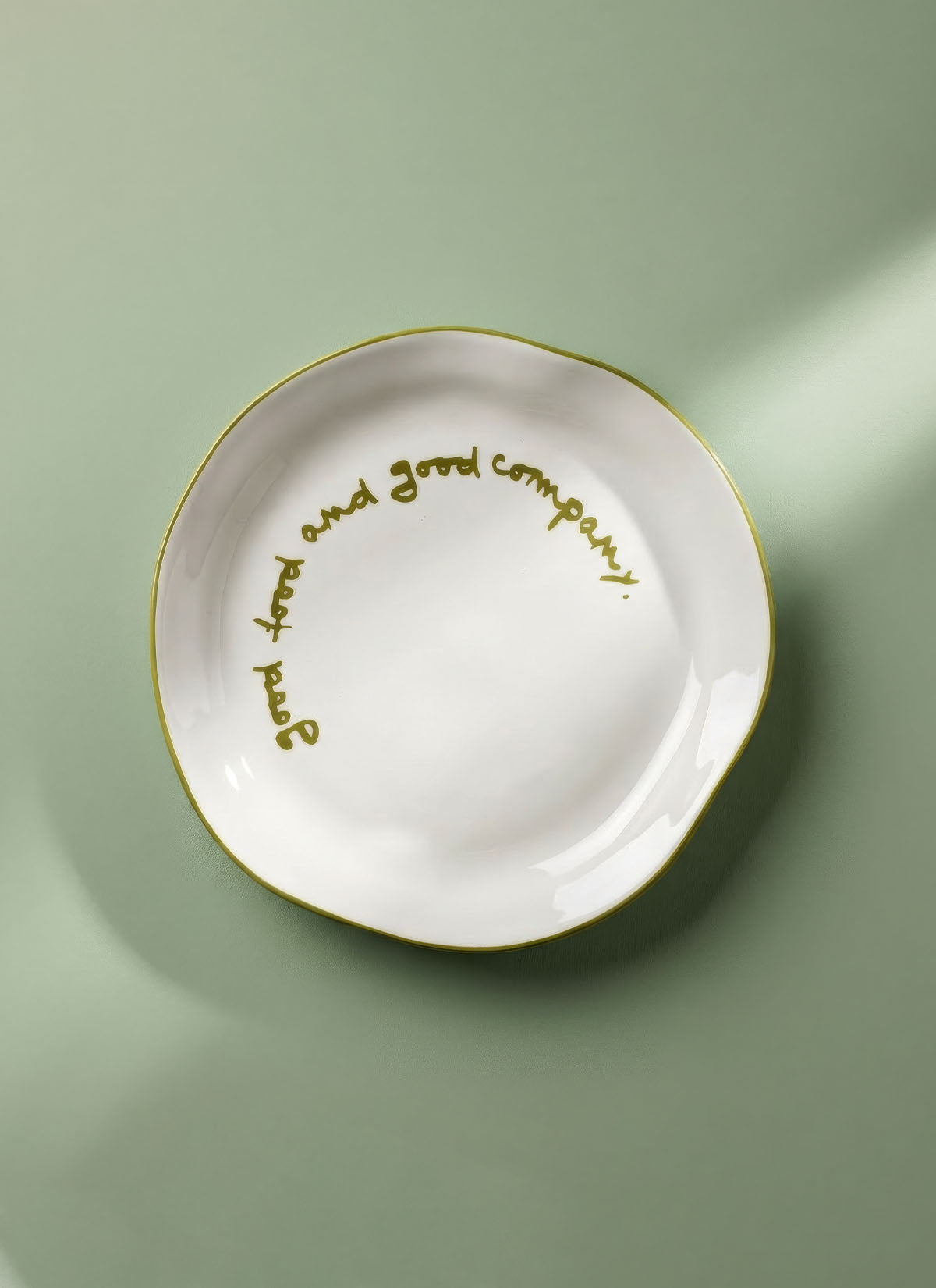 'good food and good company.' Plate