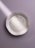 'welcome to the shit show.' Plate
